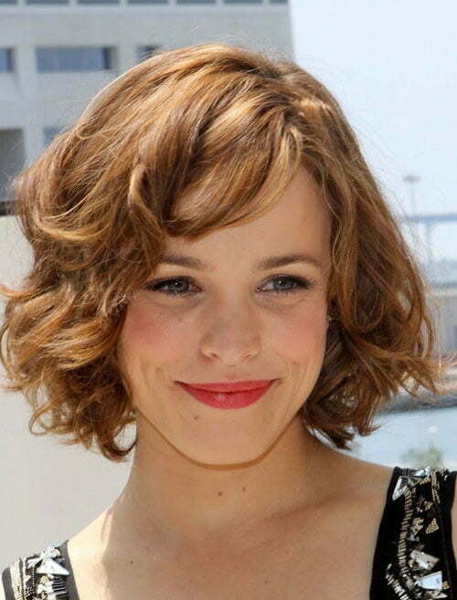Short layered curly hair with bangs