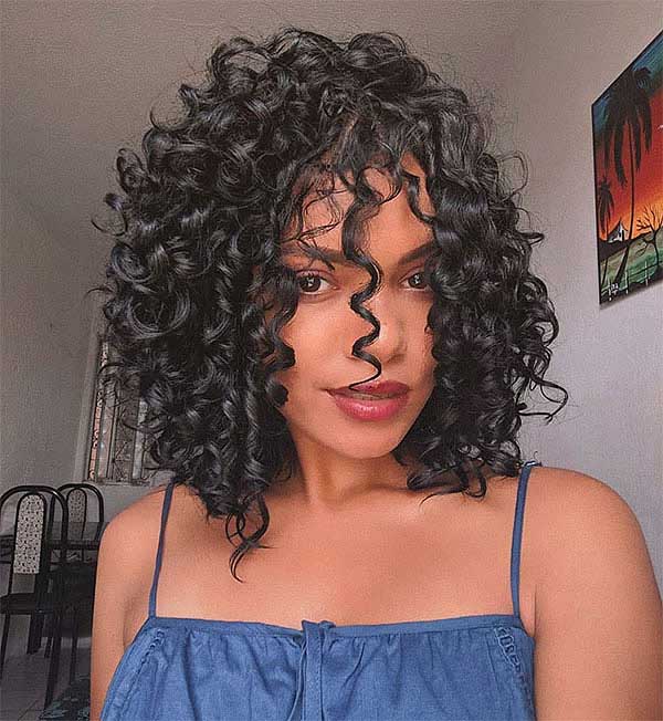 Medium Curly Haircuts For Oval Faces