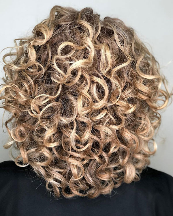 Short Curly Hair With Blonde Highlights