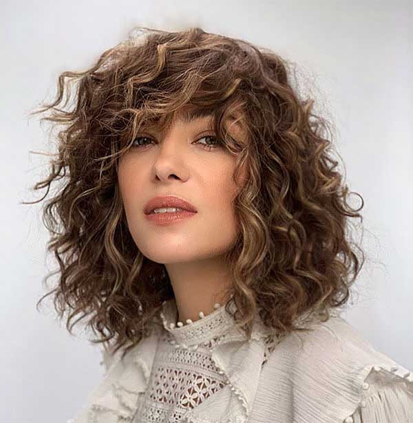 Short Curly Brown Hair With Highlights